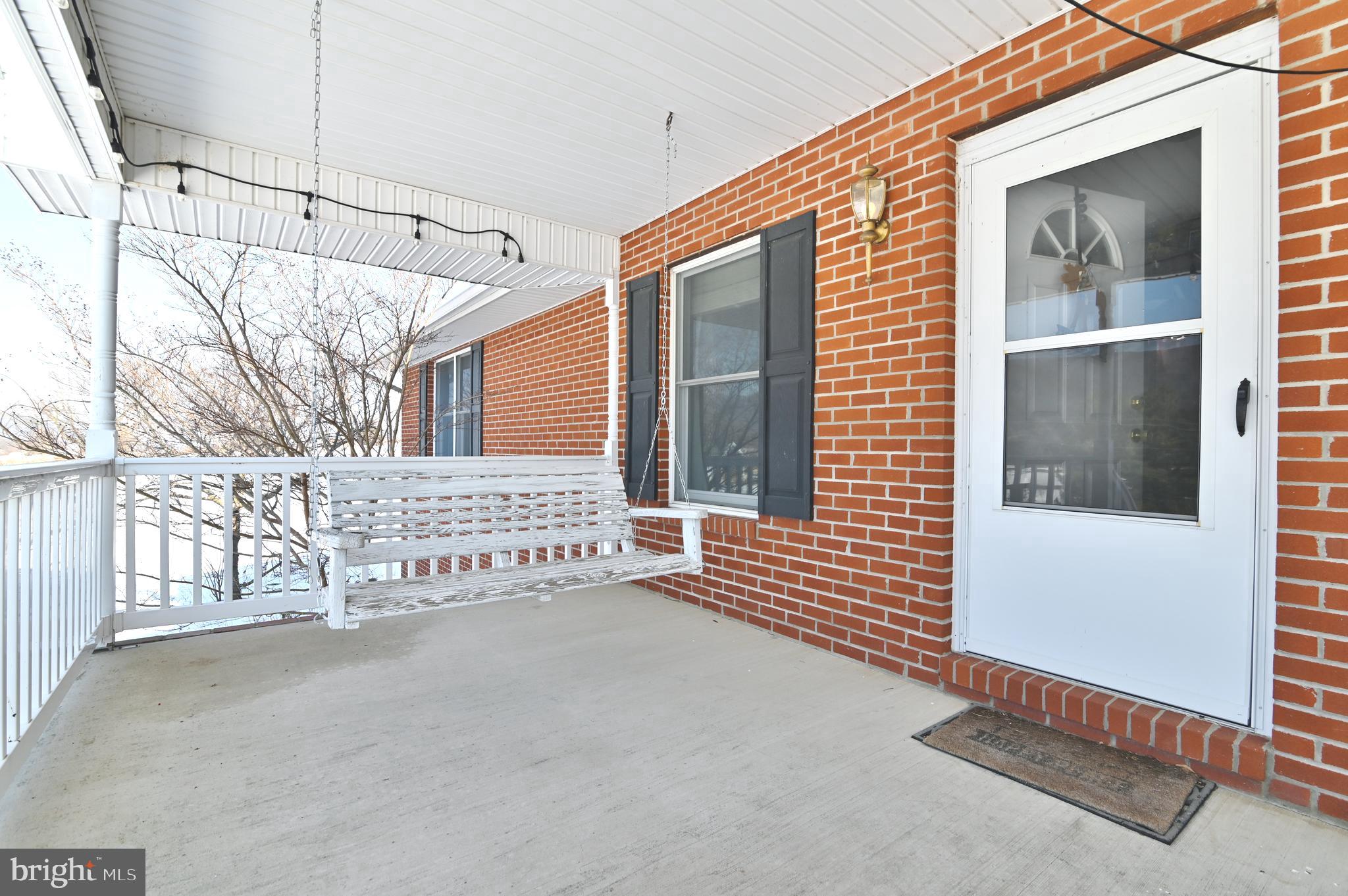 8284 Back Road Maurertown, VA 22644 - Photo 22 of 54 a view of a house with a garage
