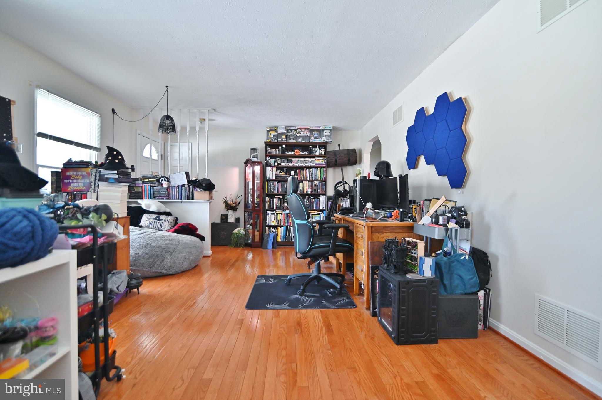 8284 Back Road Maurertown, VA 22644 - Photo 32 of 54 a living room with furniture and a wooden floor