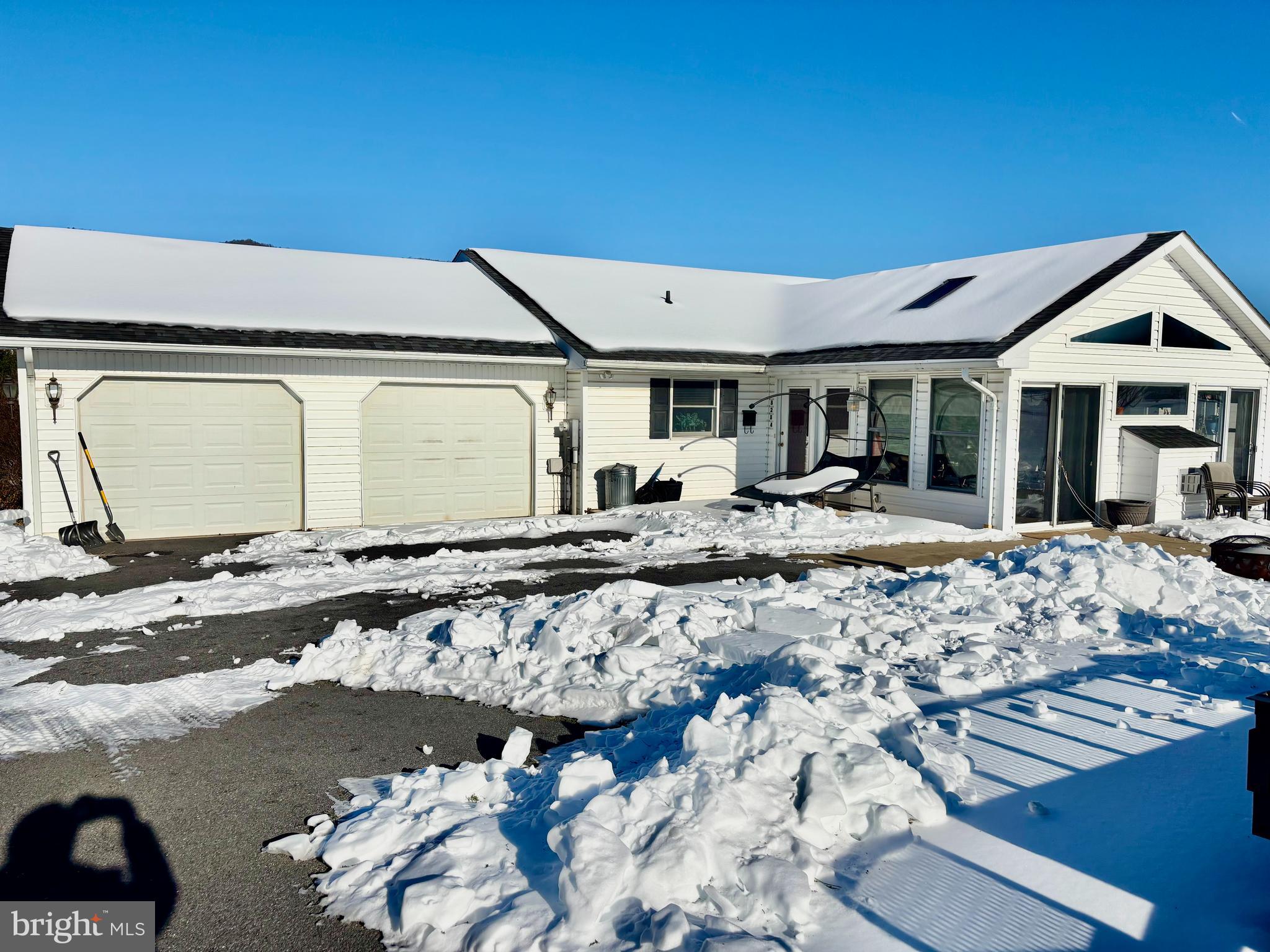 8284 Back Road Maurertown, VA 22644 - Photo 48 of 54 a front view of a house with a yard