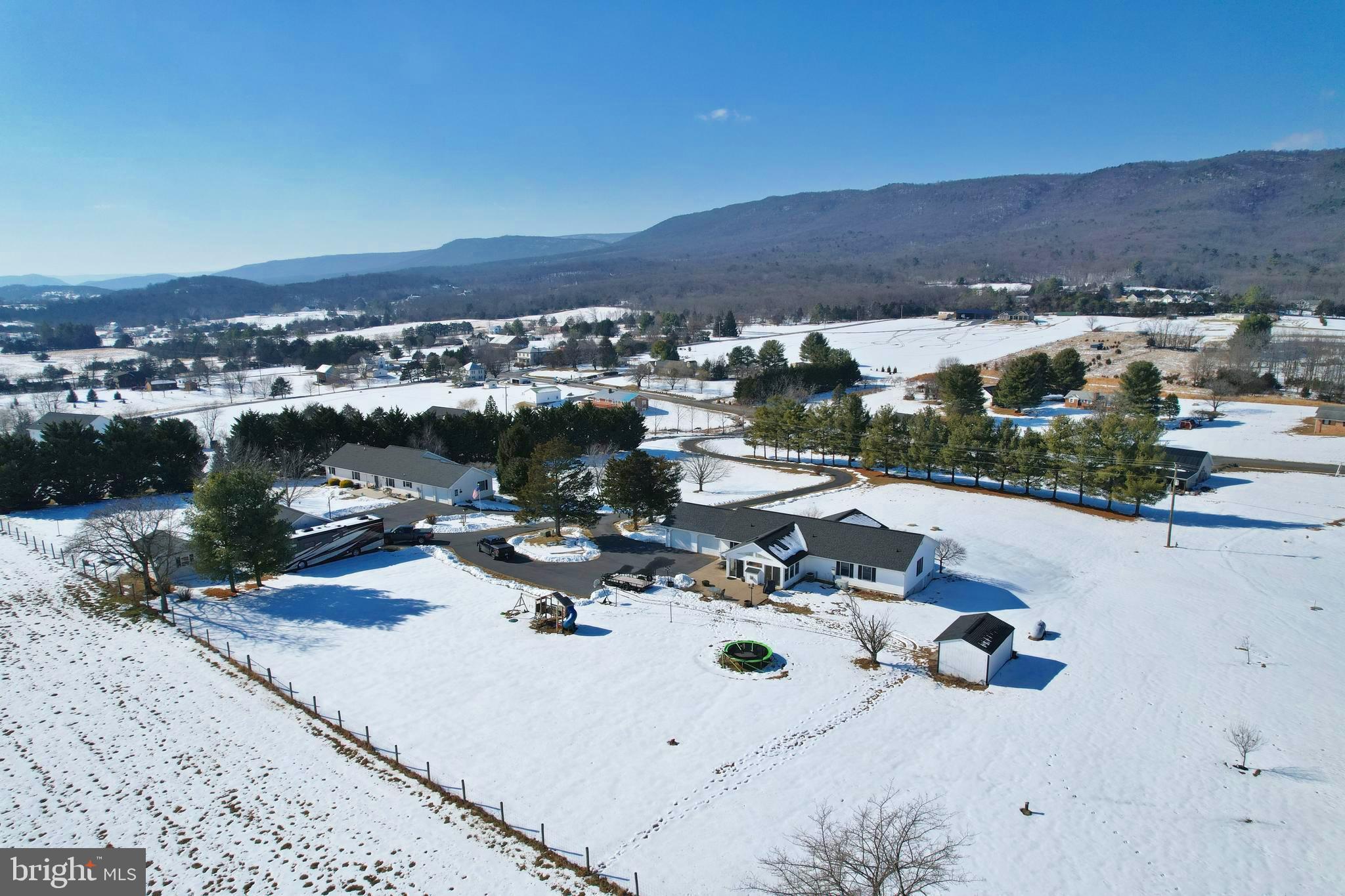 8284 Back Road Maurertown, VA 22644 - Photo 5 of 54 a view of roof deck with table and chairs
