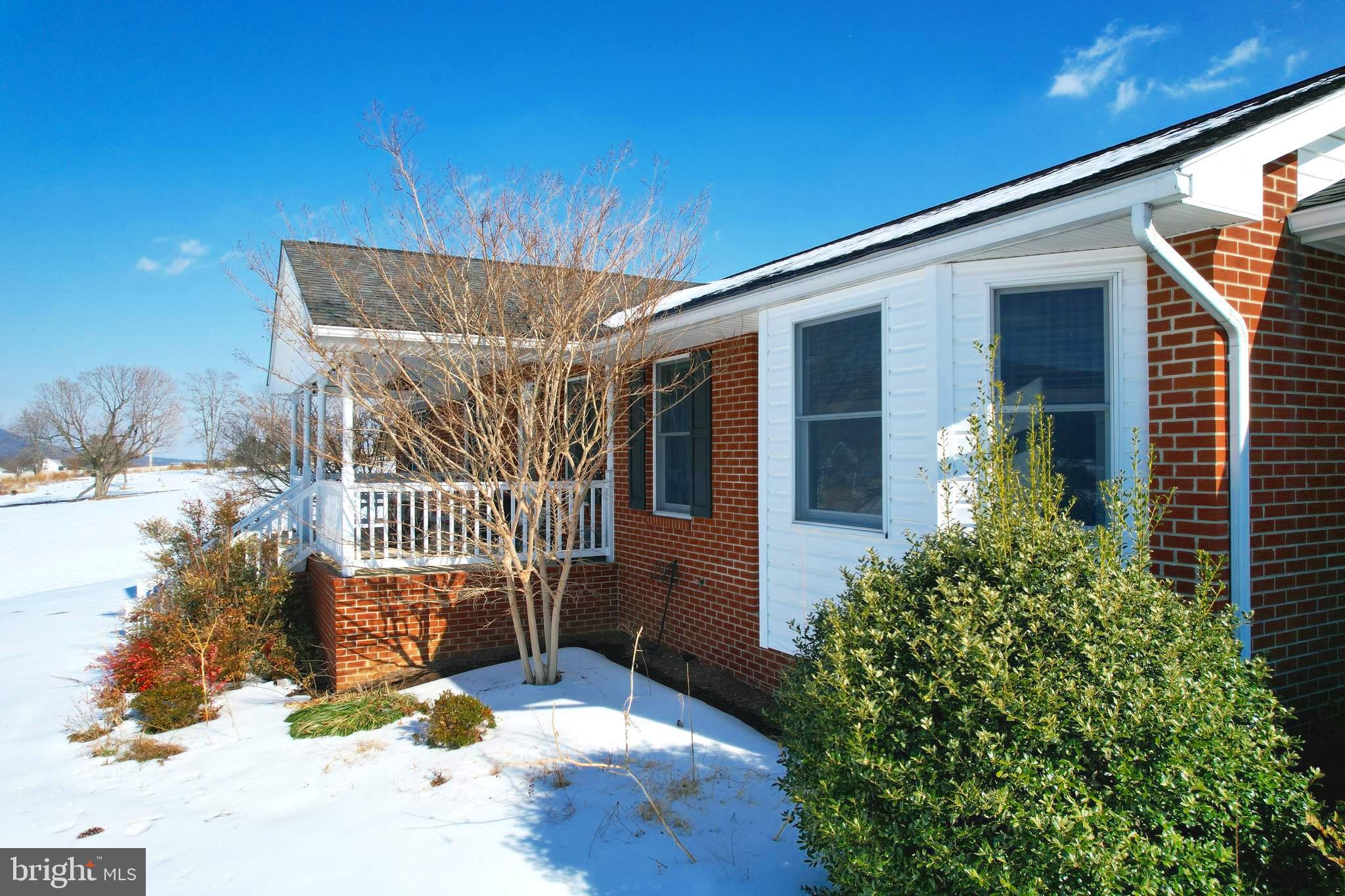 8284 Back Road Maurertown, VA 22644 - Photo 9 of 54 a view of a house with a yard