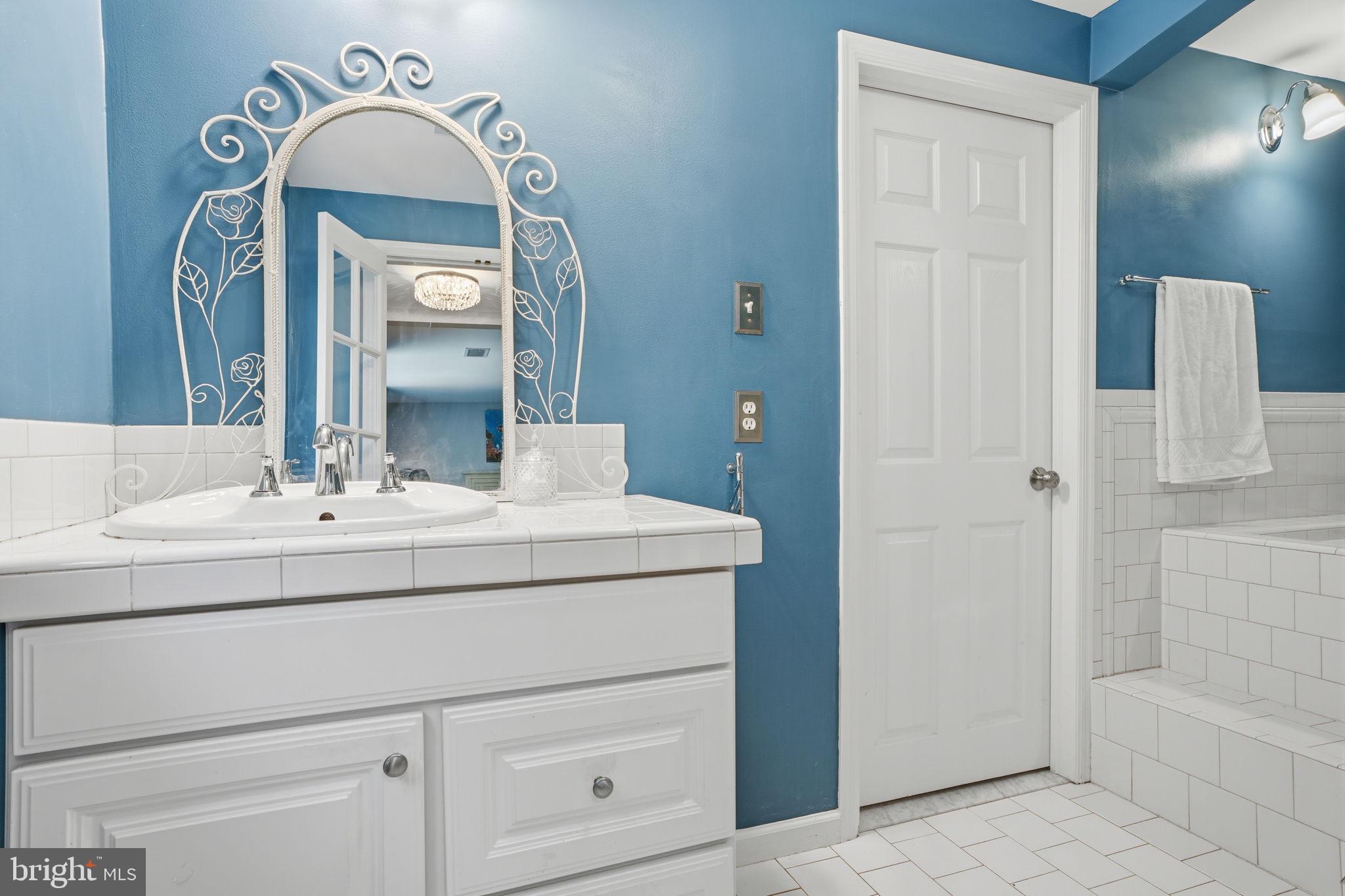 621 River Road Yardley, PA 19067 - Photo 30 of 75 a bathroom with a sink and a mirror