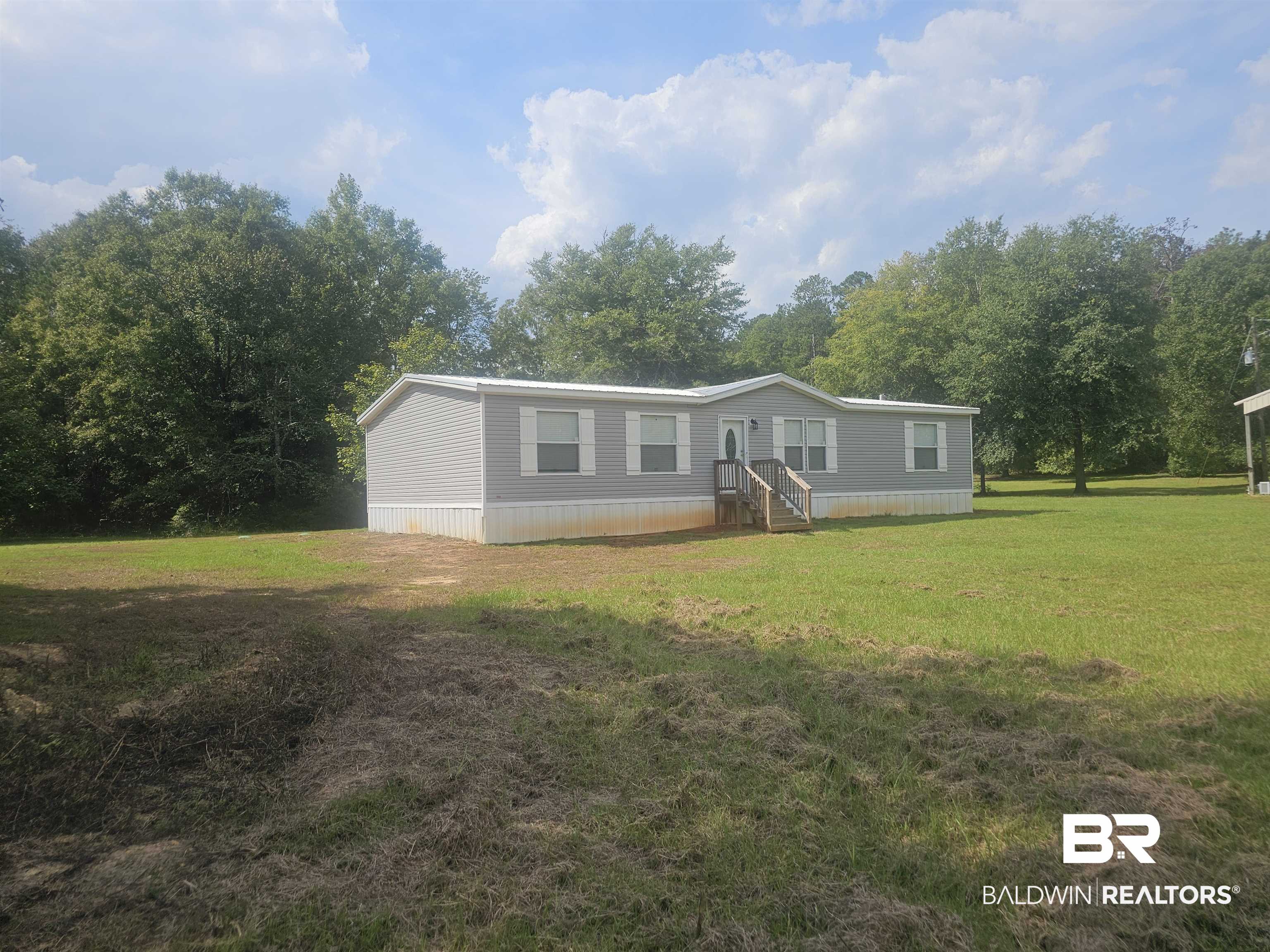 1863 Wait Road Monroeville, AL 36460 - Photo 36 of 38 Manufactured / mobile home with a front yard