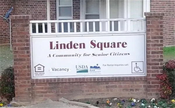 a sign on the wall of building