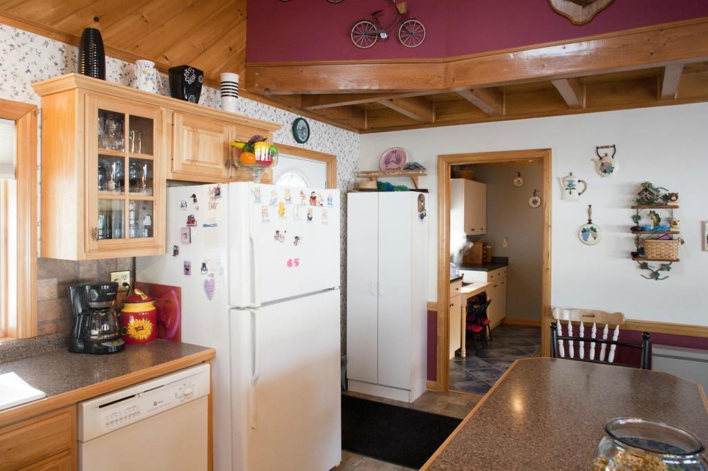 494 Springy Pond Road Ellsworth, ME 04605 - Photo 13 of 34 Kitchen has a walk in pantry with...