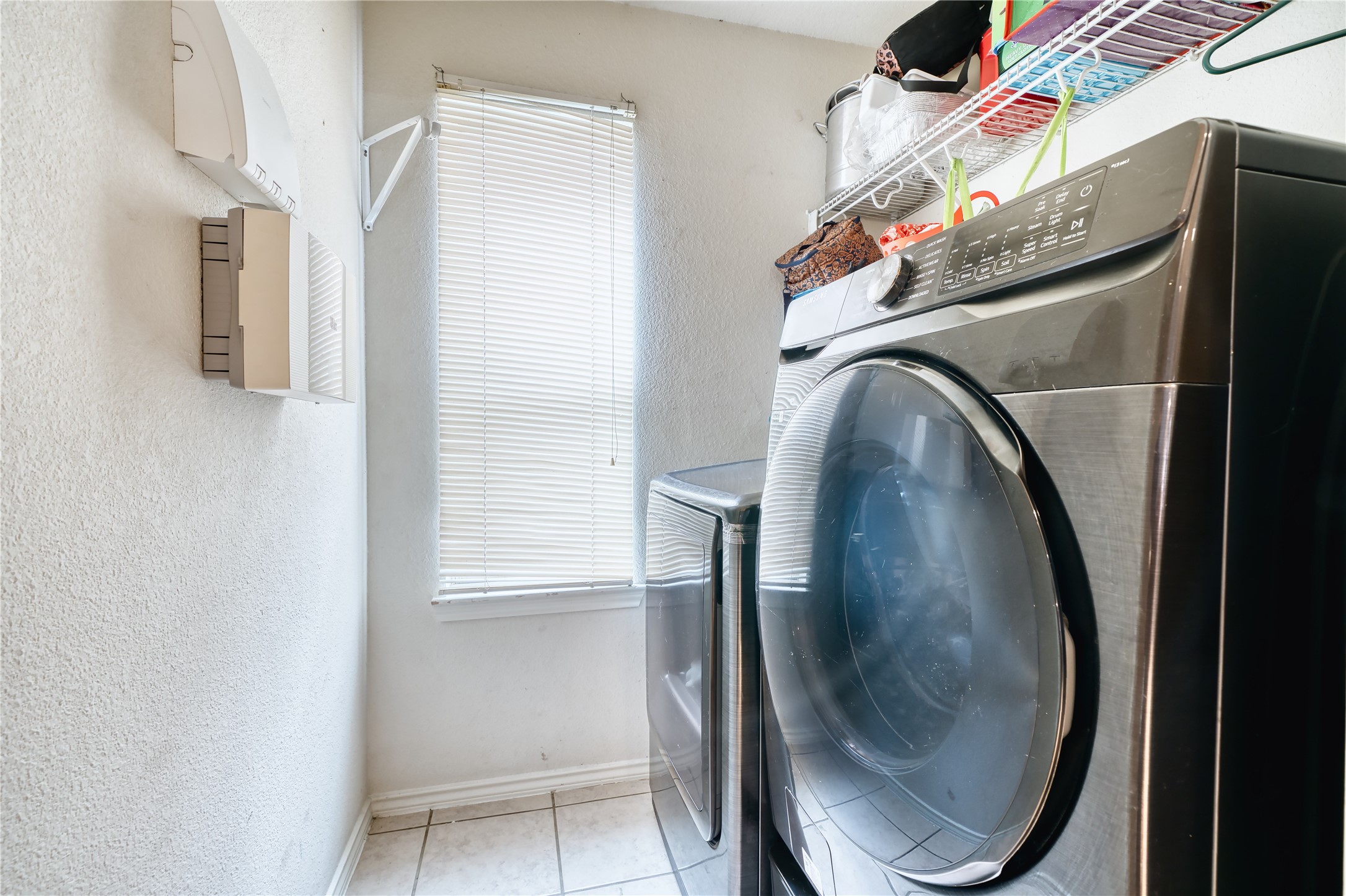 2210 Mountain Ranch Drive Houston, TX 77049 - Photo 22 of 36 a utility room with dryer and washer