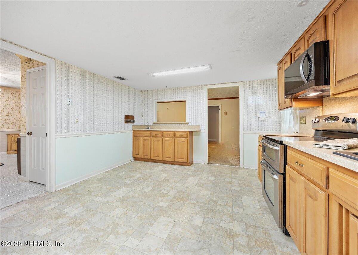 3510 Sandburg Road Jacksonville, FL 32277 - Photo 7 of 25 Kitchen Breakfast Area