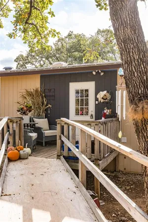 a view of a house with patio outdoor seating