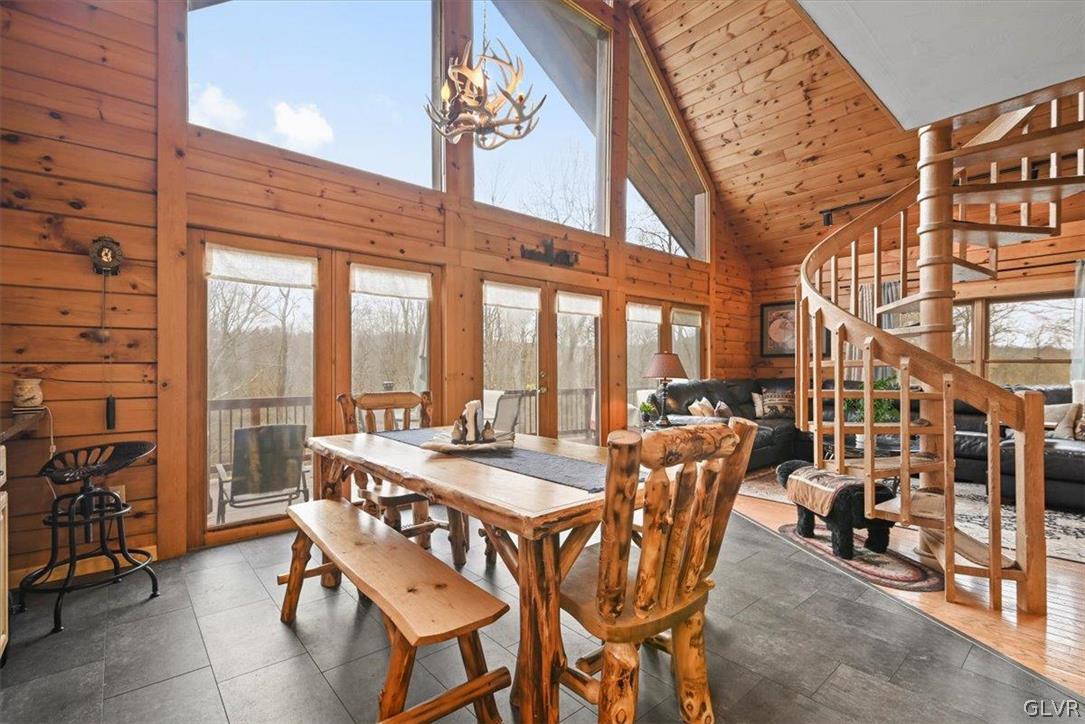 461 T Rte 318 Moscow, PA 18444 - Photo 11 of 50 a view of a patio with a table and chairs and potted plants
