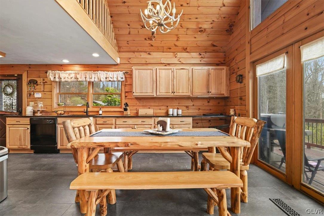 461 T Rte 318 Moscow, PA 18444 - Photo 12 of 50 a dining table with chairs and window