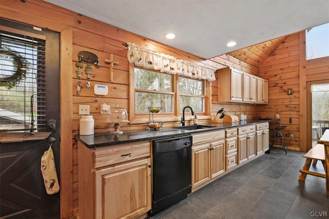 461 T Rte 318 Moscow, PA 18444 - Photo 15 of 50 a kitchen with stainless steel appliances granite countertop a sink and cabinets