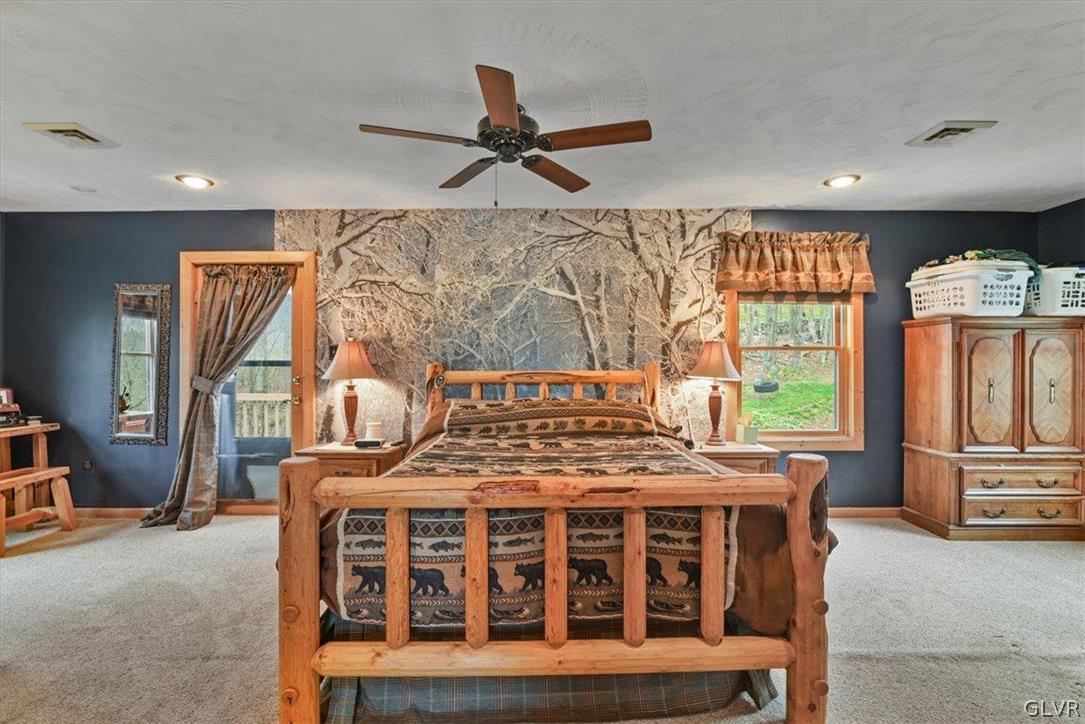 461 T Rte 318 Moscow, PA 18444 - Photo 25 of 50 a bedroom with furniture and windows