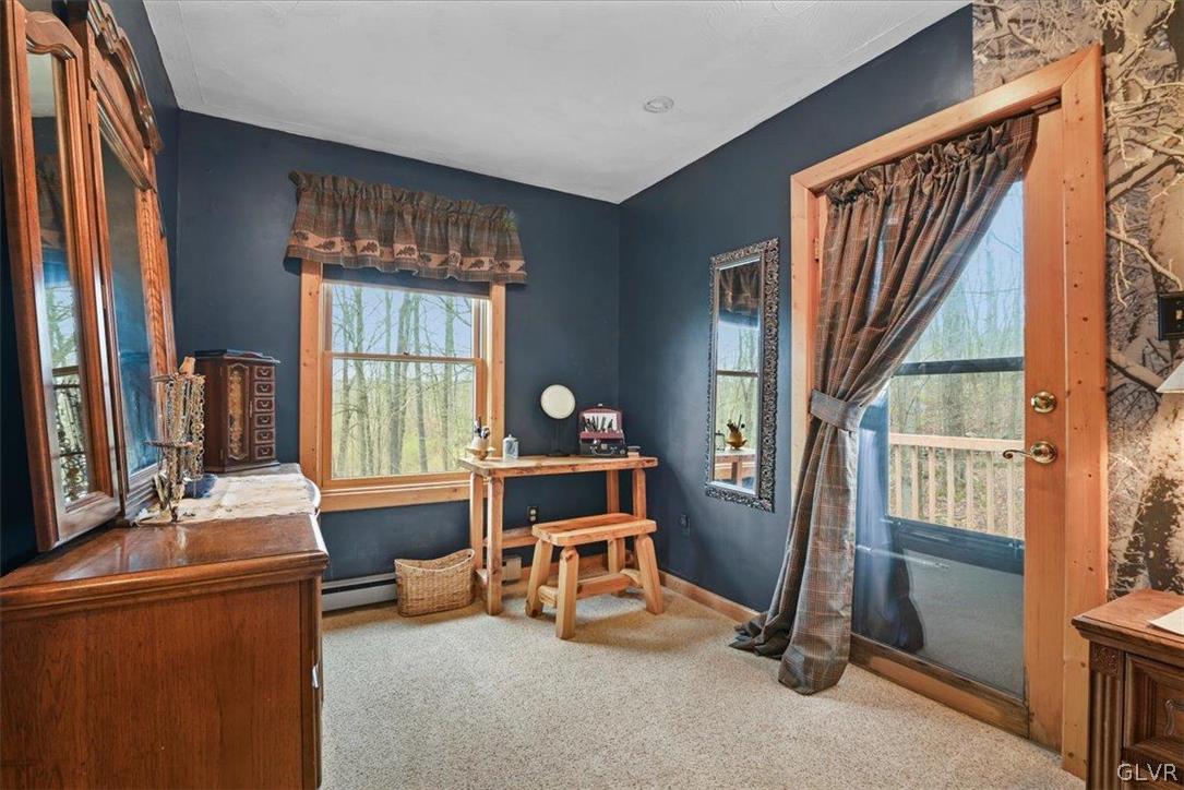 461 T Rte 318 Moscow, PA 18444 - Photo 26 of 50 a room with furniture and a window
