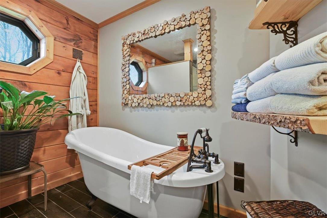 461 T Rte 318 Moscow, PA 18444 - Photo 28 of 50 a living room with furniture and a mirror