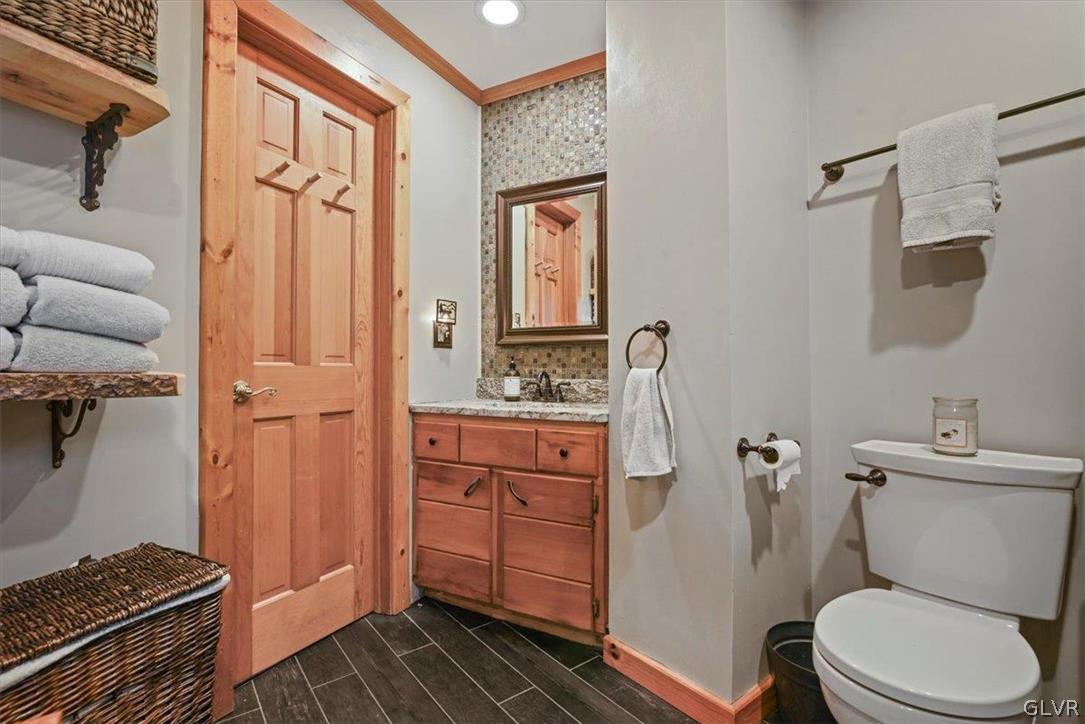 461 T Rte 318 Moscow, PA 18444 - Photo 29 of 50 a bathroom with a granite countertop toilet sink and shower