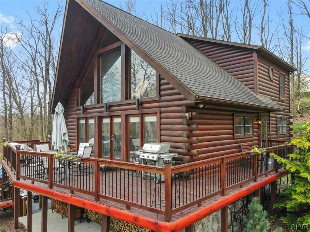 461 T Rte 318 Moscow, PA 18444 - Photo 37 of 50 a view of a house with a deck and furniture