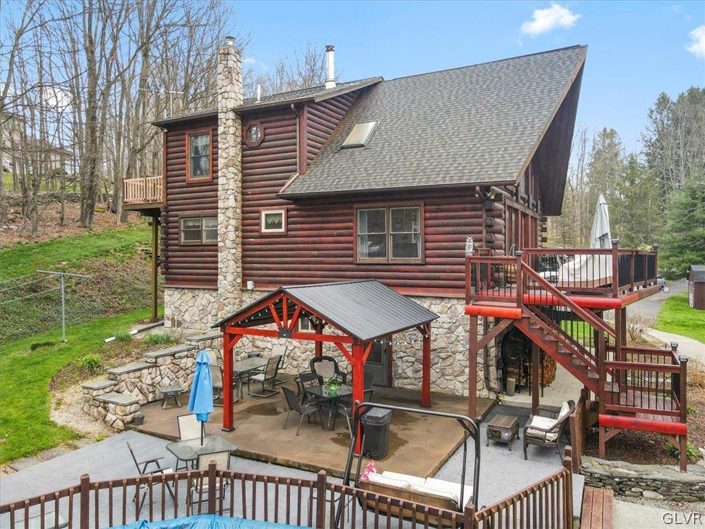 461 T Rte 318 Moscow, PA 18444 - Photo 38 of 50 a view of houses with a patio