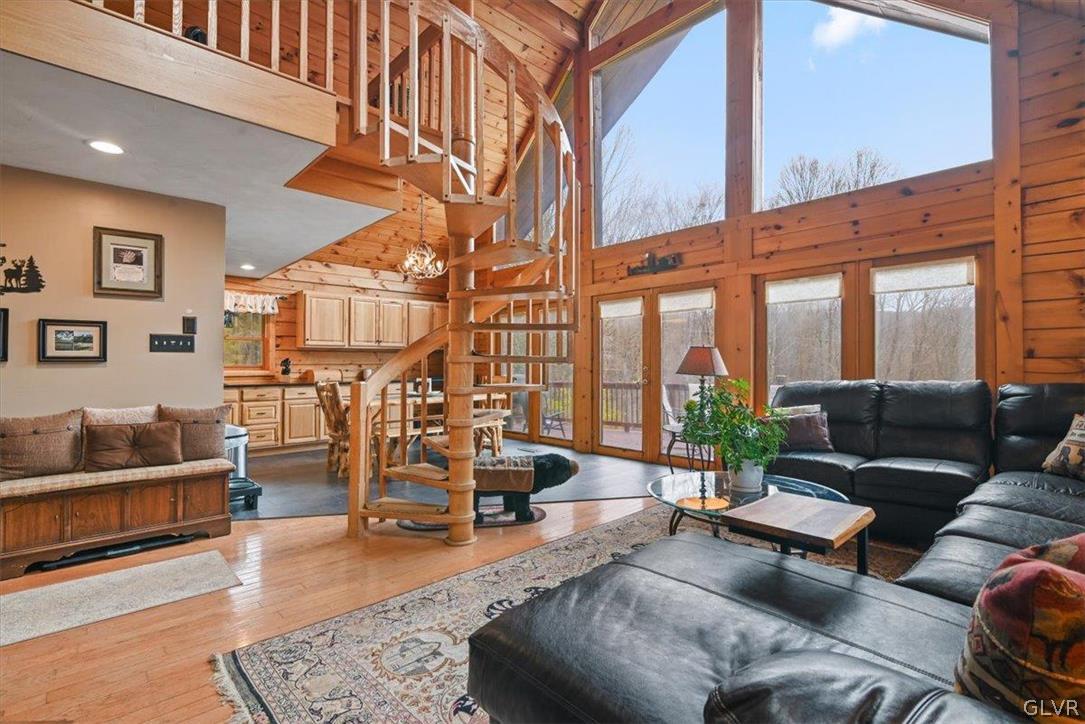 461 T Rte 318 Moscow, PA 18444 - Photo 4 of 50 a living room with furniture wooden floor and a large window
