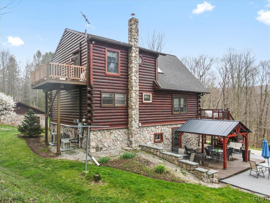 461 T Rte 318 Moscow, PA 18444 - Photo 41 of 50 a front view of a house with garden