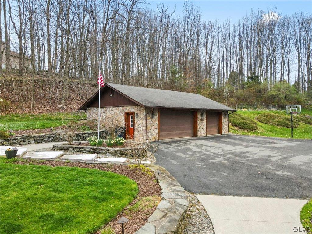 461 T Rte 318 Moscow, PA 18444 - Photo 43 of 50 a front view of a house with garden