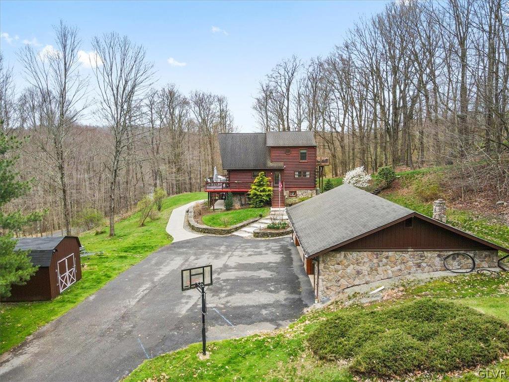 461 T Rte 318 Moscow, PA 18444 - Photo 46 of 50 a view of a chair and table in backyard of the house