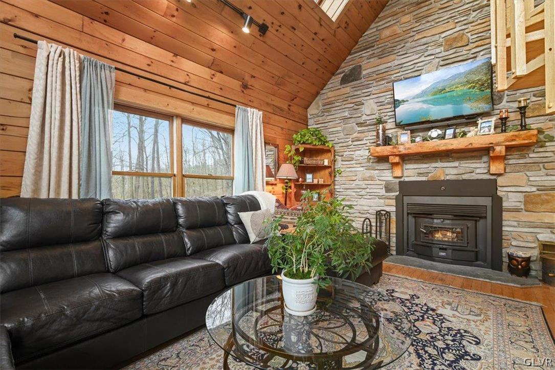 461 T Rte 318 Moscow, PA 18444 - Photo 6 of 50 a living room with furniture and a fireplace