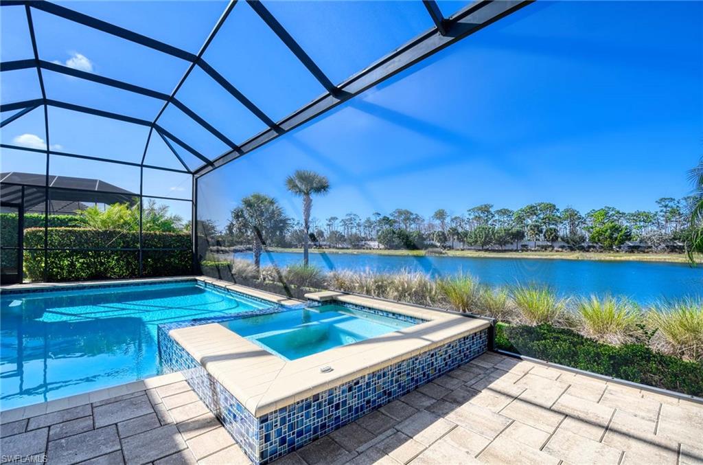 6159 Rodney Bay Lane Naples, FL 34113 - Photo 27 of 50 a view of a backyard with sitting area