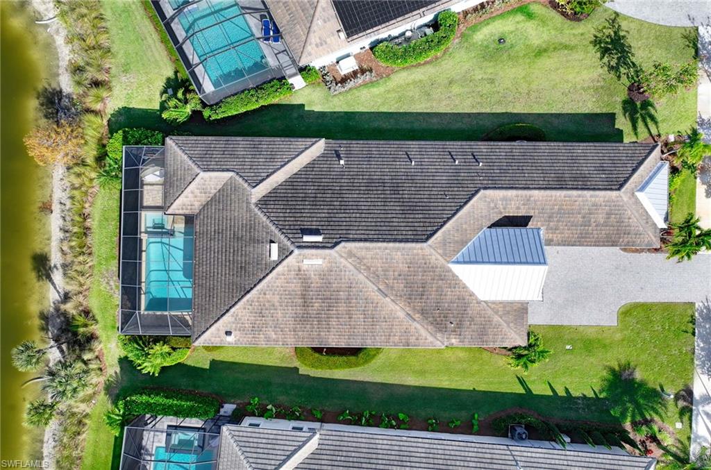 6159 Rodney Bay Lane Naples, FL 34113 - Photo 48 of 50 an aerial view of a house