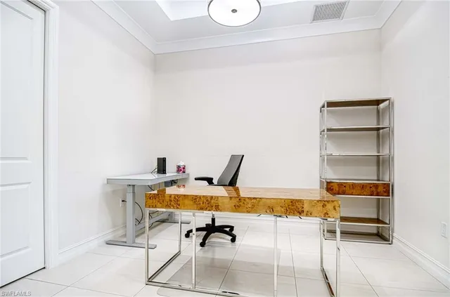 a view of a workspace with furniture