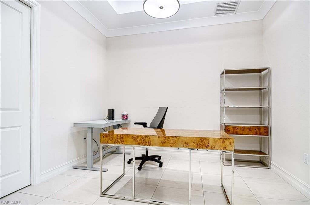 6159 Rodney Bay Lane Naples, FL 34113 - Photo 7 of 50 a view of a workspace with furniture