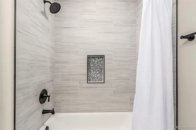 an empty room with closet area