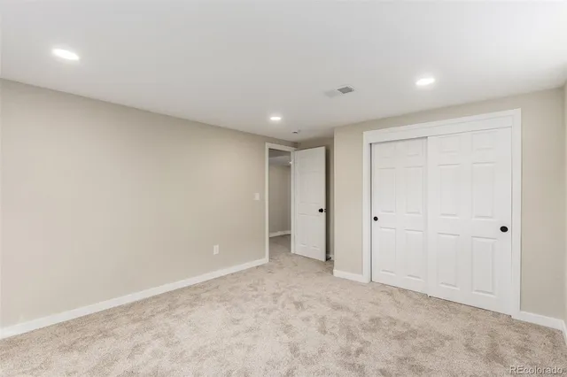 a view of a house with backyard and porch