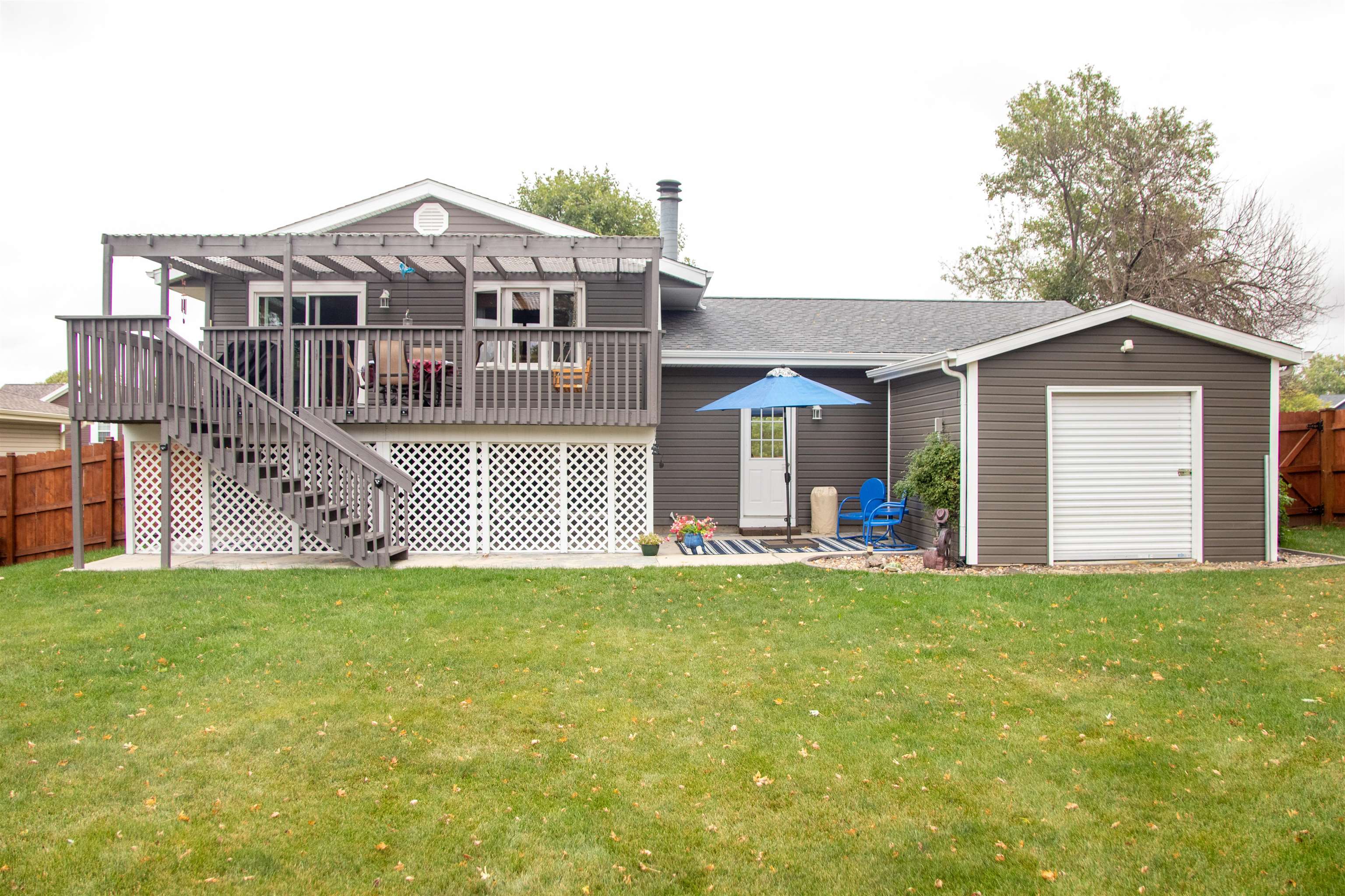 207 Westfield Road Winnebago, IL 61088 - Photo 3 of 27 a front view of a house with a yard