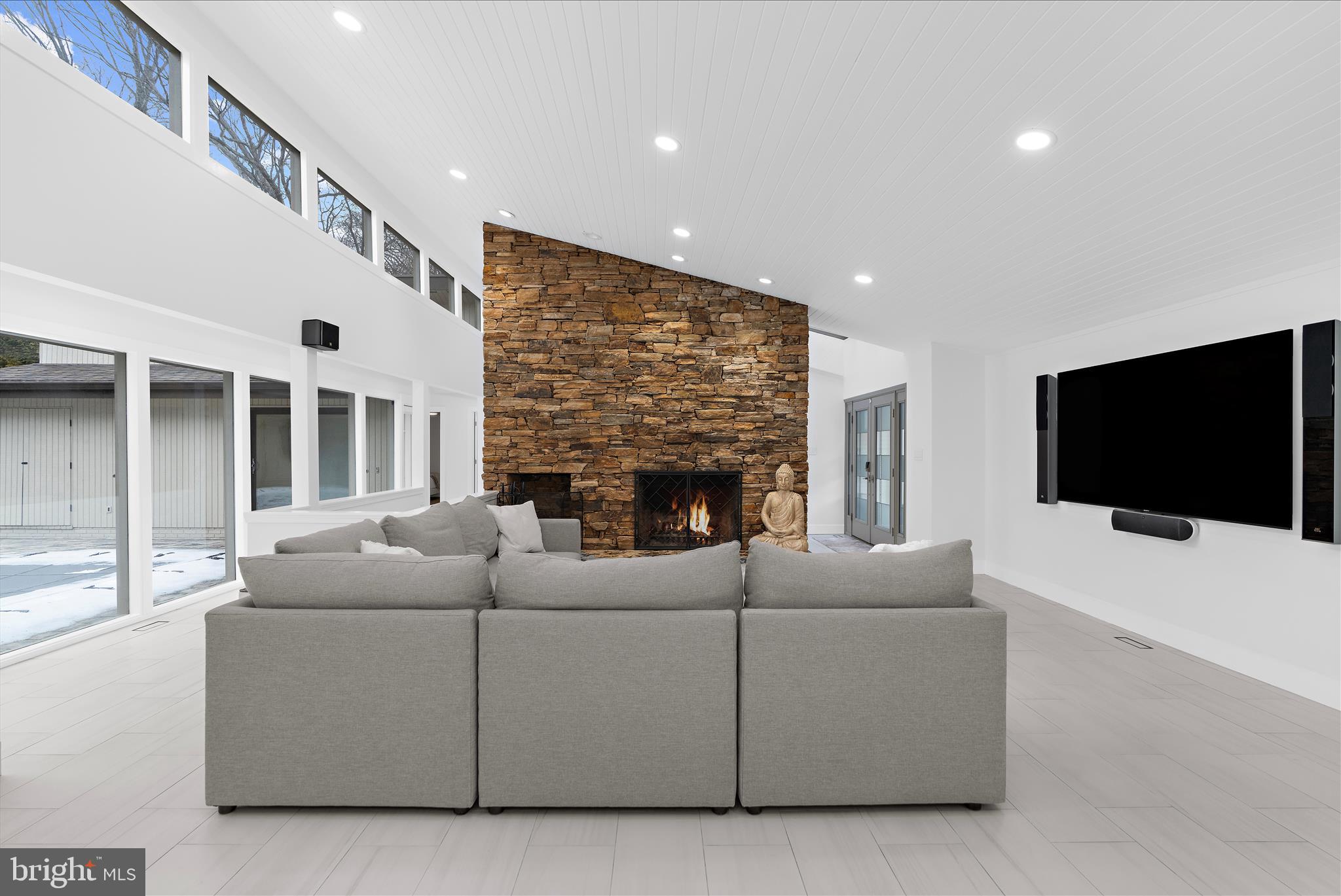 2308 Caves Road Owings Mills, MD 21117 - Photo 10 of 70 a living room with furniture and a flat screen tv