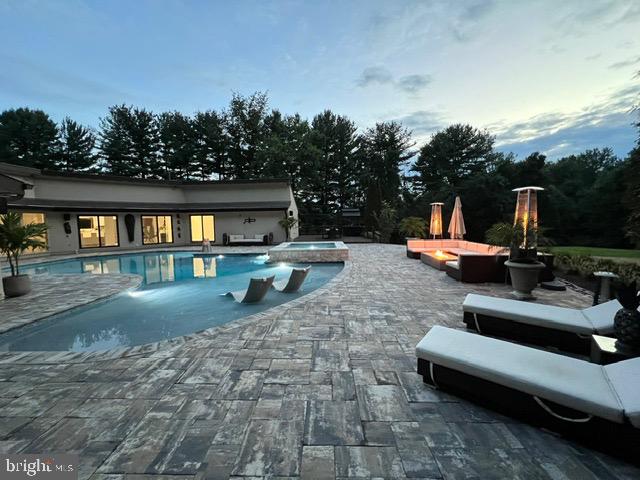 2308 Caves Road Owings Mills, MD 21117 - Photo 2 of 70 a view of a swimming pool with a patio