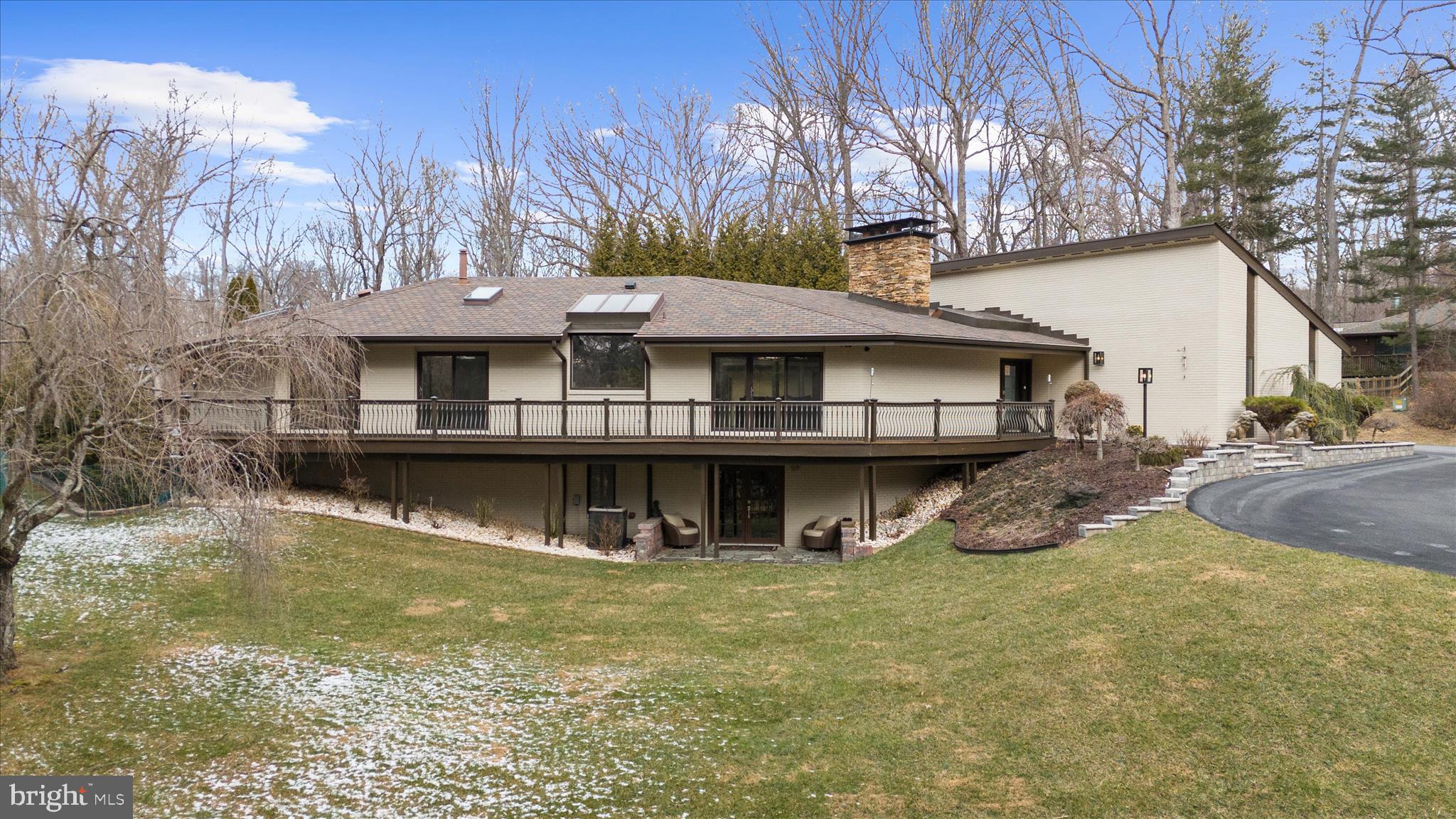 2308 Caves Road Owings Mills, MD 21117 - Photo 4 of 70 a view of a house with pool and chairs