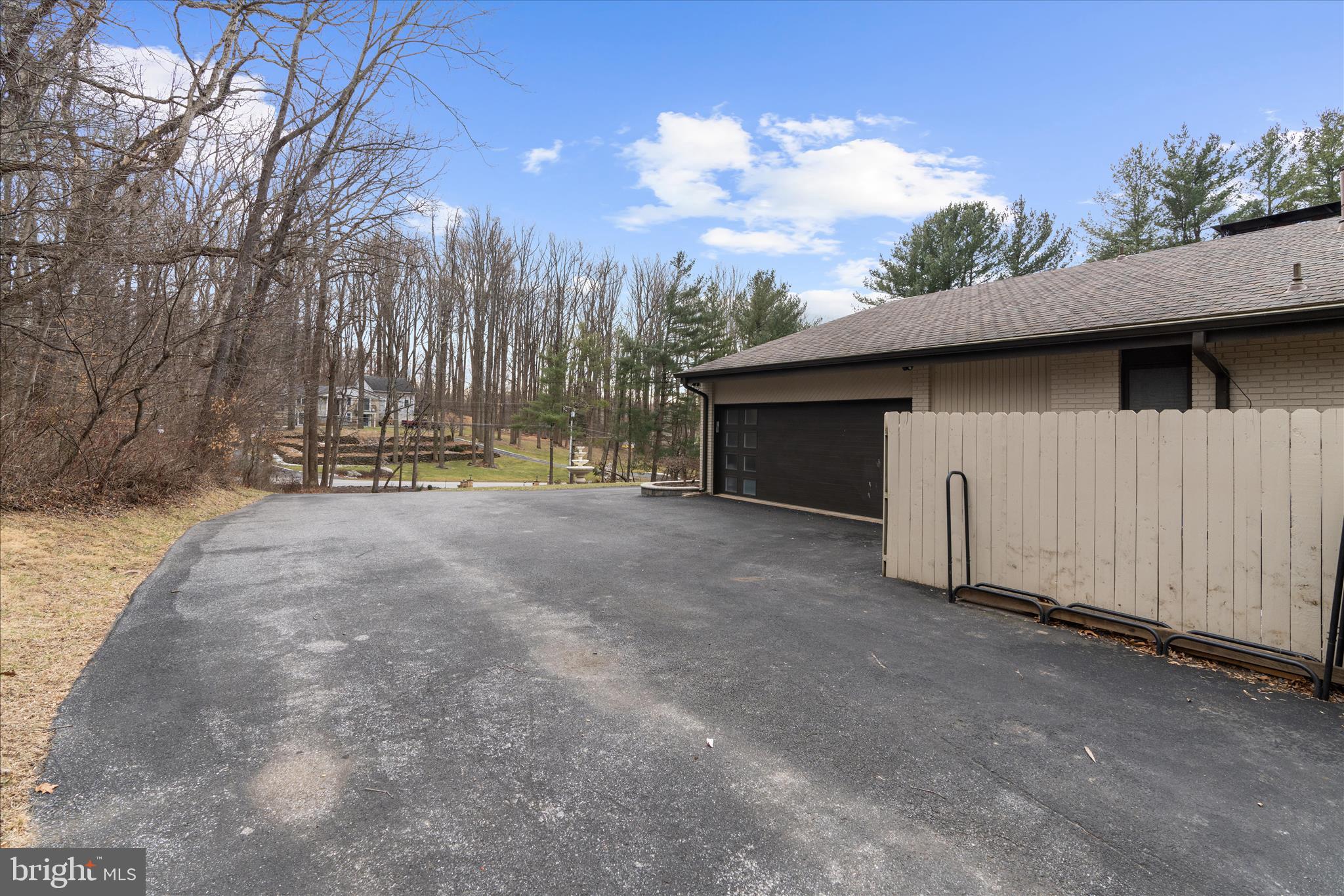 2308 Caves Road Owings Mills, MD 21117 - Photo 54 of 70 a view of a house with a yard and garage