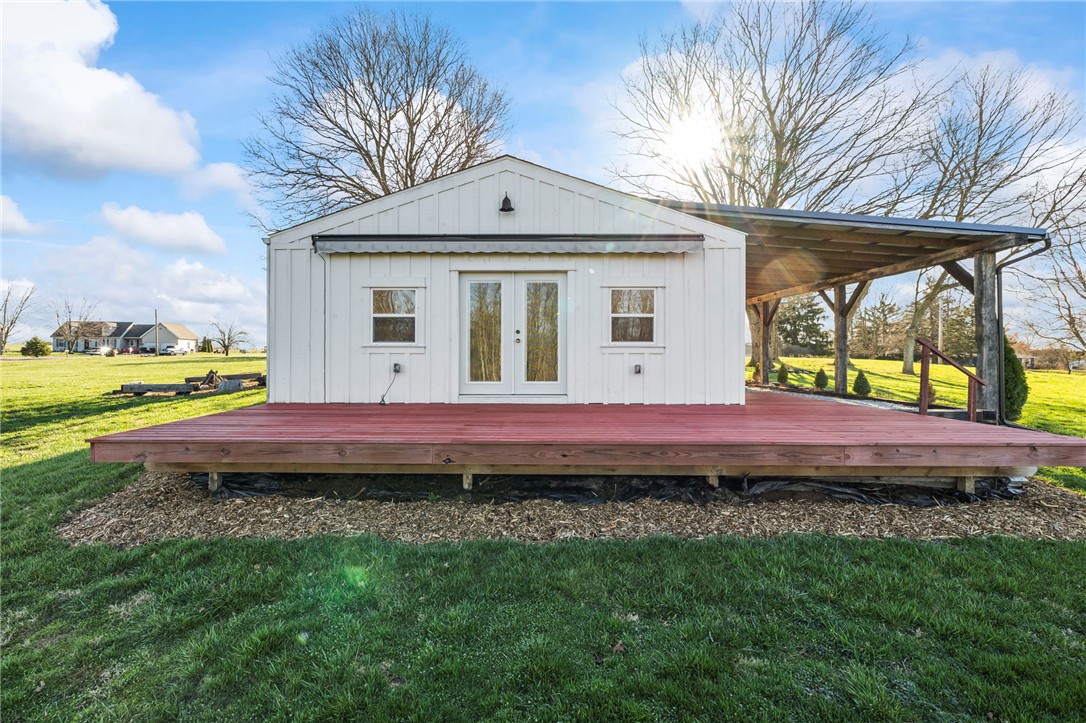10797 Gratis Jacksonburg Road Somerville, OH 45064 - Photo 7 of 27 This charming cottage offers a spacious deck, perfect for outdoor enjoyment and serene living.
