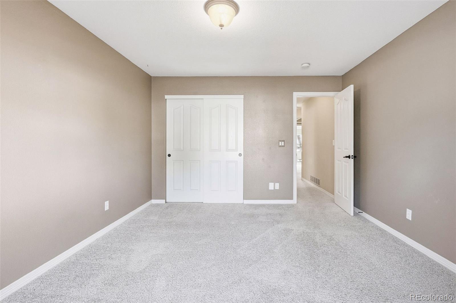 10482 Grizzly Gulch Highlands Ranch, CO 80129 - Photo 36 of 50 a view of an empty room