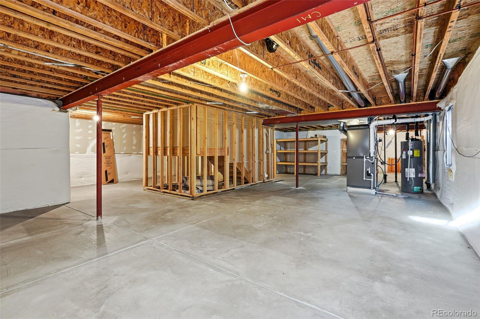 10482 Grizzly Gulch Highlands Ranch, CO 80129 - Photo 41 of 50 a view of empty room with wooden walls