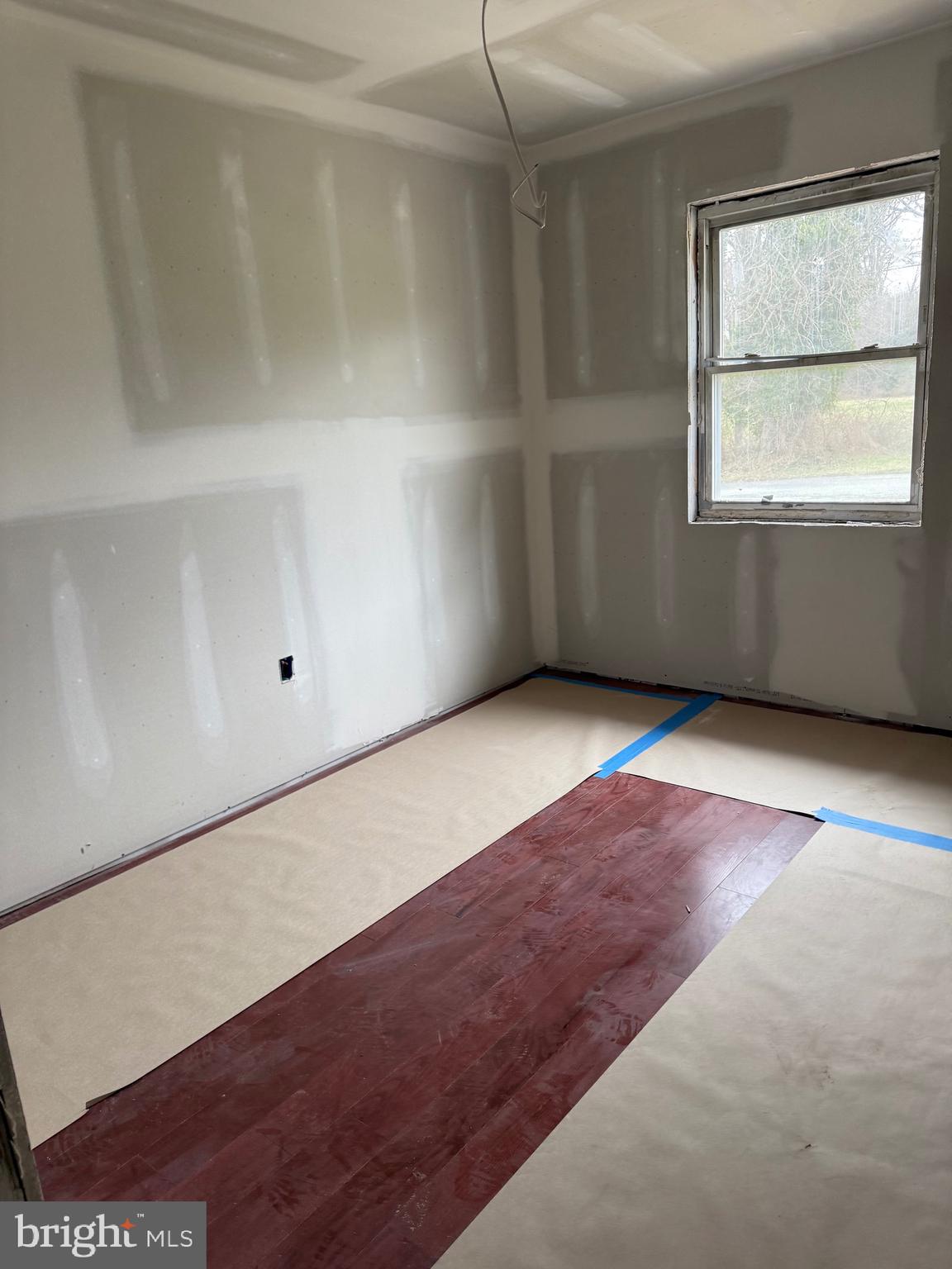17 Ridley Drive Wallingford, PA 19086 - Photo 4 of 13 a view of an empty room with a window
