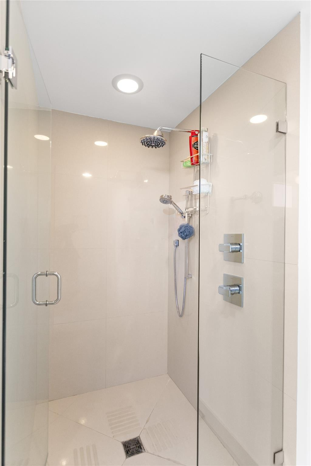 600 Northeast 27th Street, Unit 2301 Miami, FL 33137 - Photo 18 of 77 a bathroom with a shower and a shower