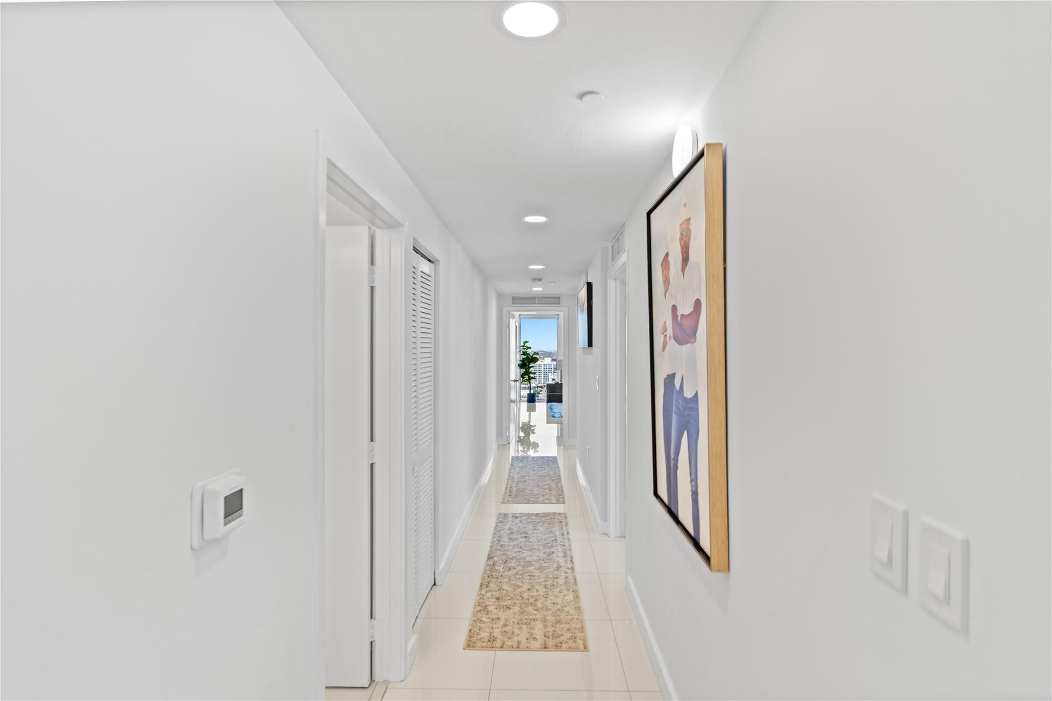 600 Northeast 27th Street, Unit 2301 Miami, FL 33137 - Photo 35 of 77 a view of a hallway with wooden floor and a bathroom