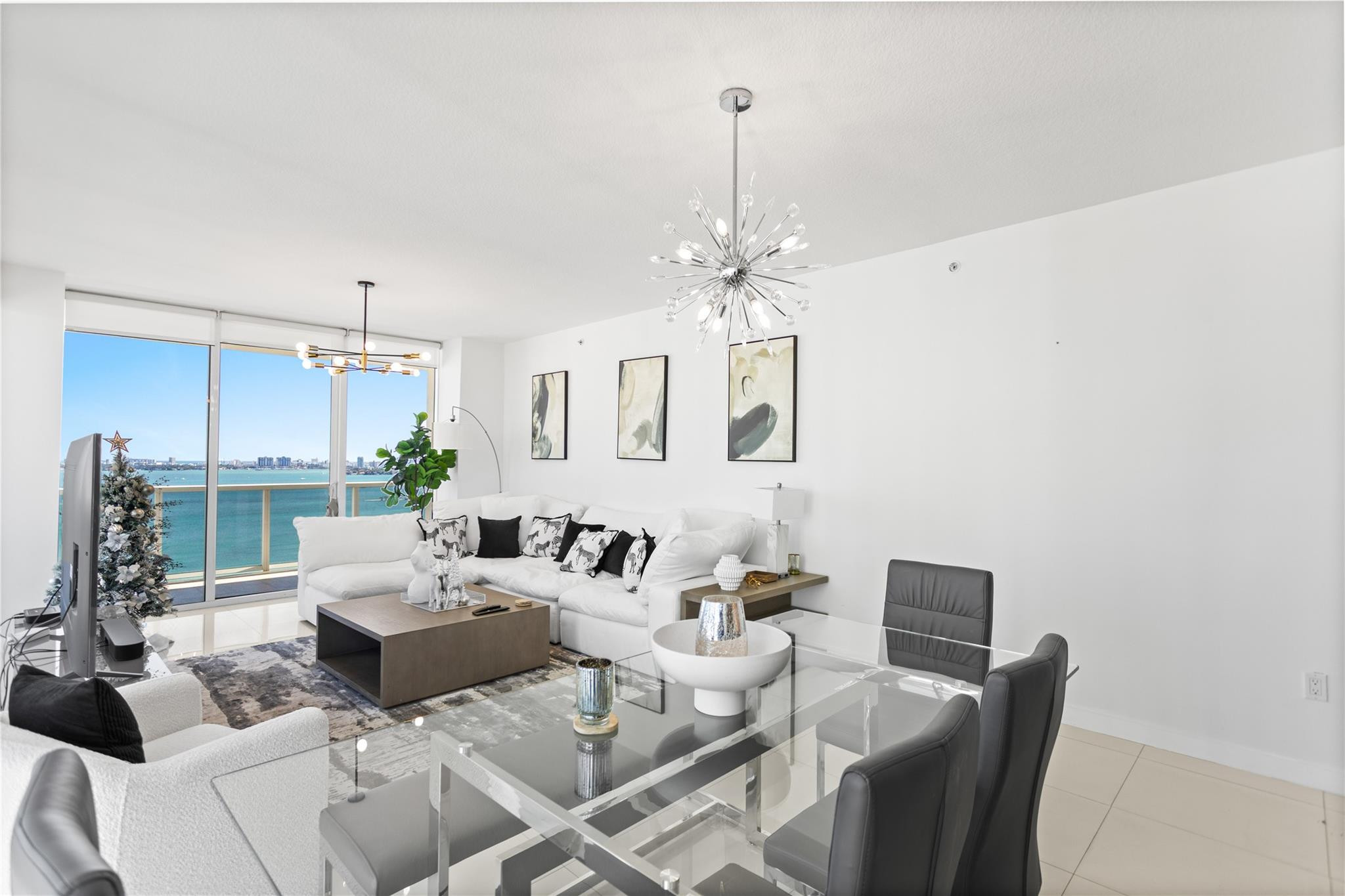 600 Northeast 27th Street, Unit 2301 Miami, FL 33137 - Photo 48 of 77 a living room with furniture and a chandelier