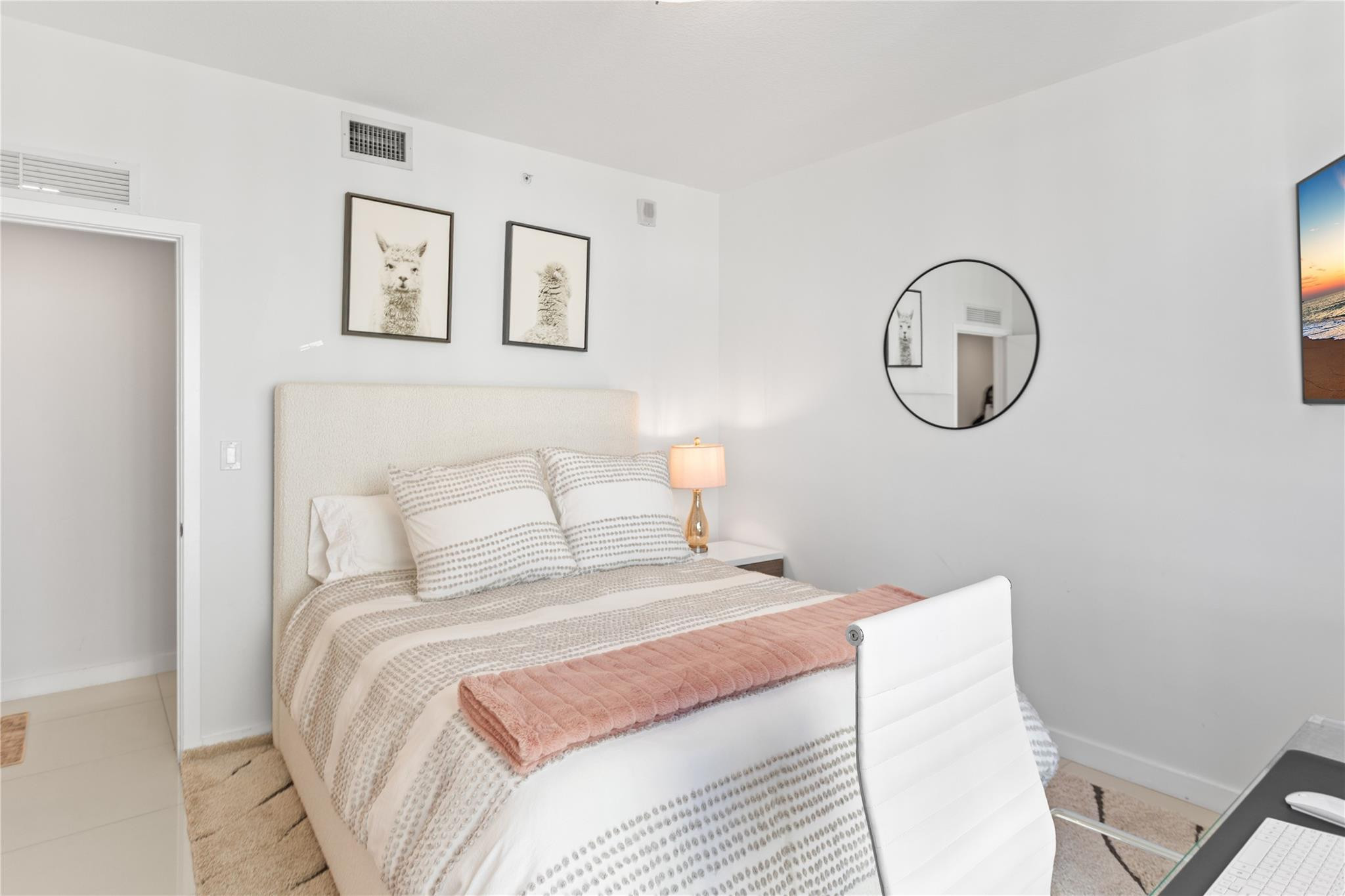 600 Northeast 27th Street, Unit 2301 Miami, FL 33137 - Photo 58 of 77 a bedroom with a bed and a wall painting