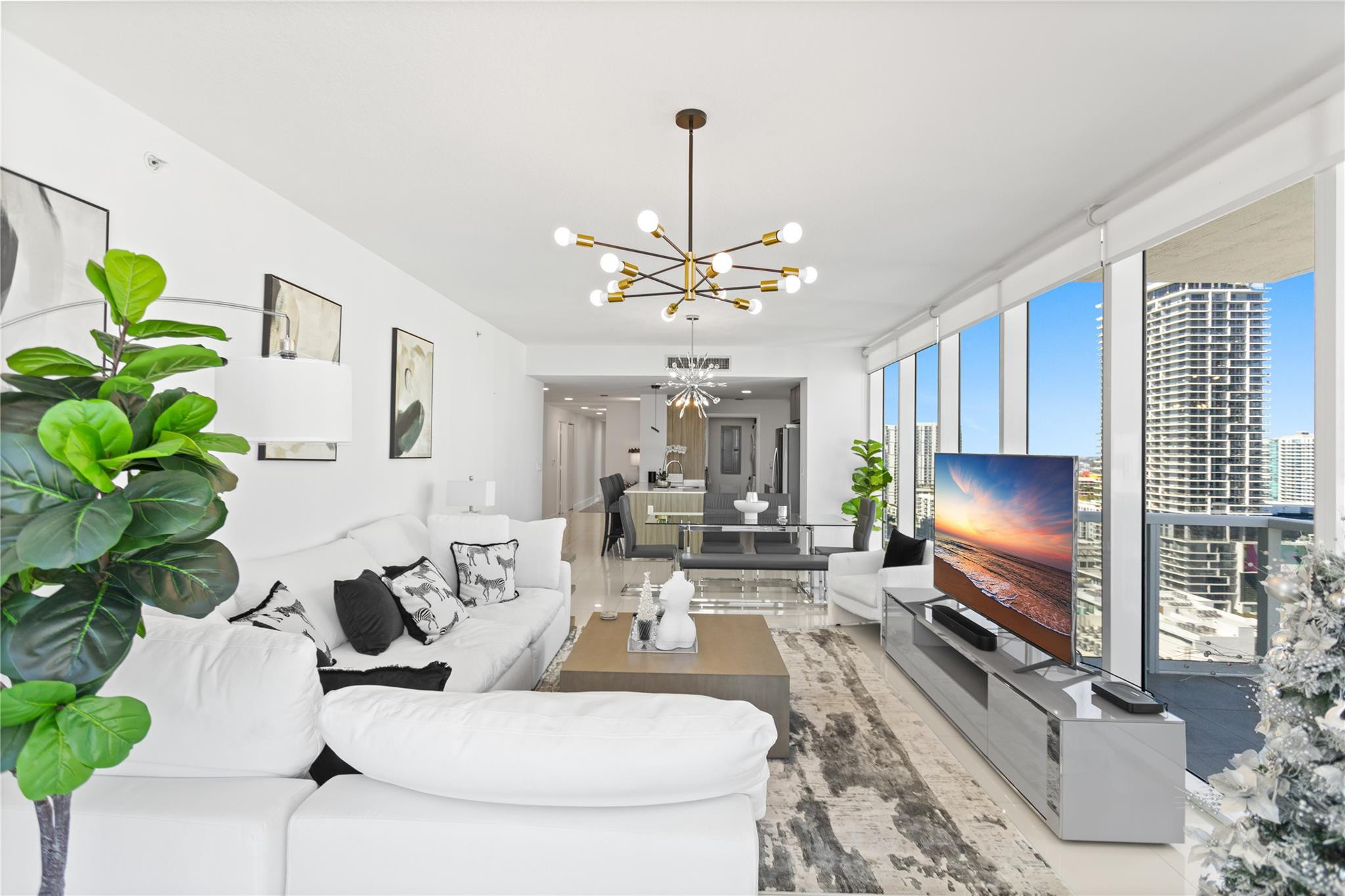 600 Northeast 27th Street, Unit 2301 Miami, FL 33137 - Photo 66 of 77 a living room with furniture and a flat screen tv