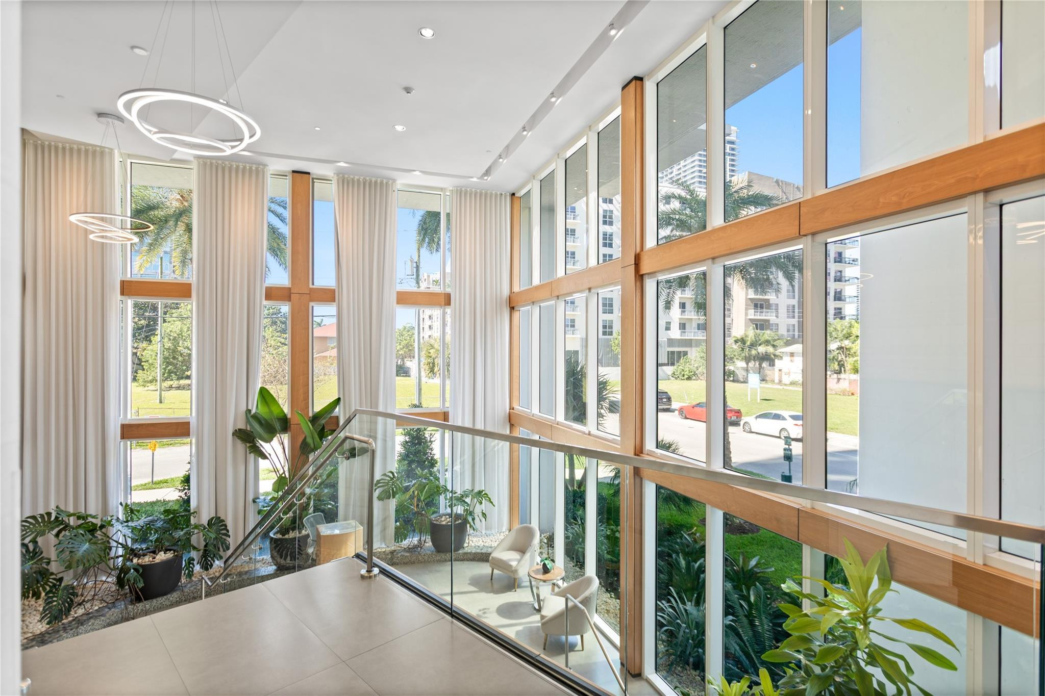 600 Northeast 27th Street, Unit 2301 Miami, FL 33137 - Photo 10 of 77 a view of an entryway with wooden floor and a potted plant