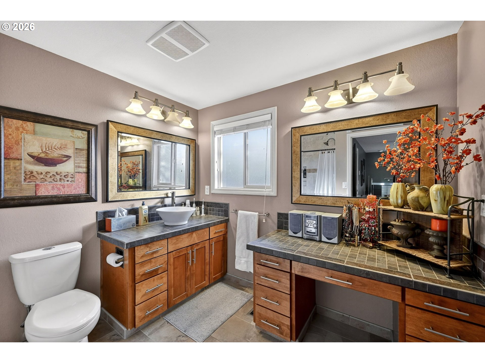 2445 Debok Road West Linn, OR 97068 - Photo 19 of 45 a bathroom with a toilet sink and mirror