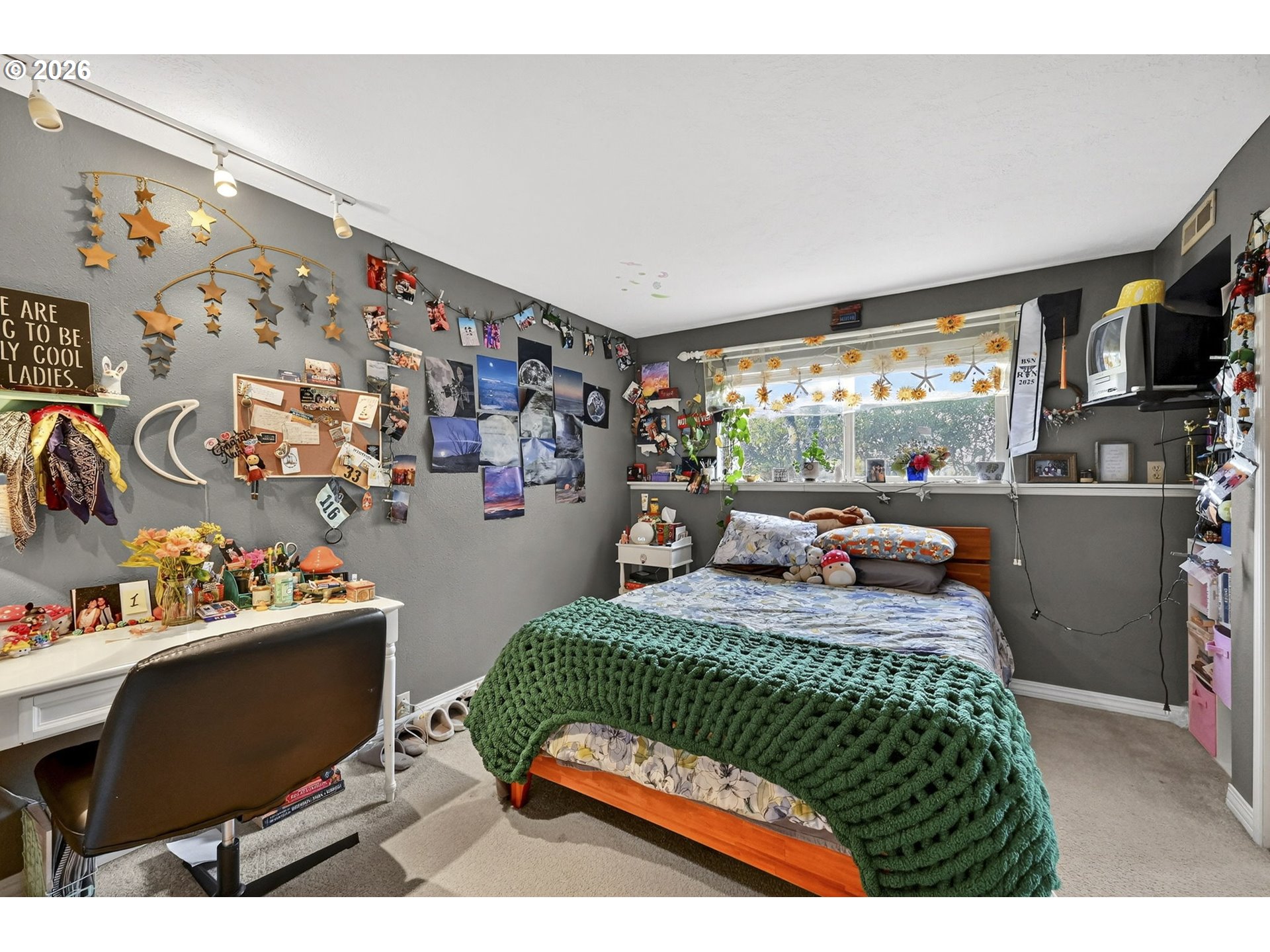 2445 Debok Road West Linn, OR 97068 - Photo 29 of 45 a bedroom with furniture and a window