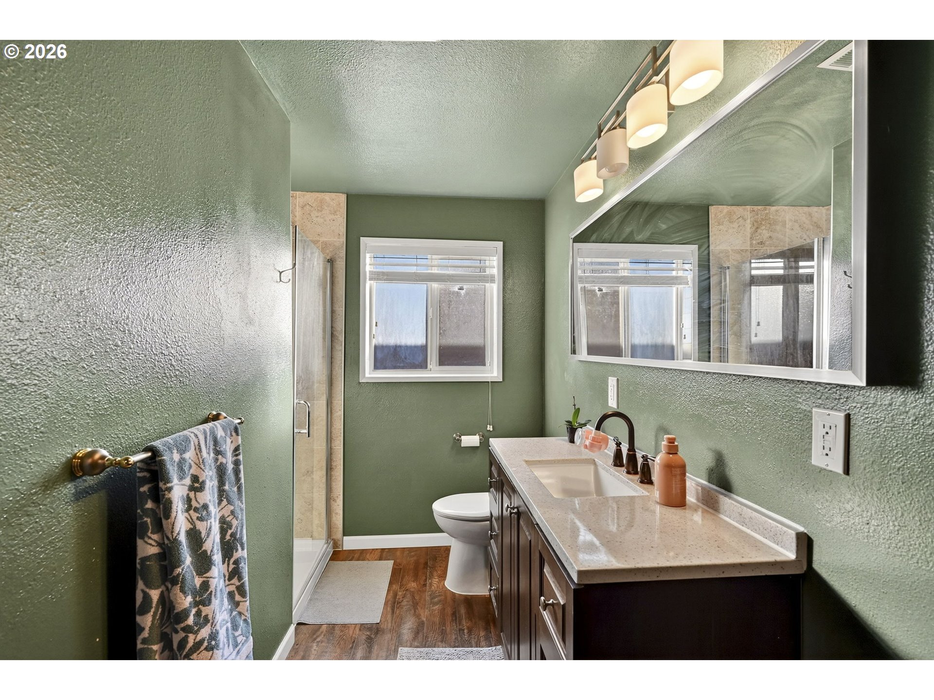 2445 Debok Road West Linn, OR 97068 - Photo 31 of 45 a bathroom with a sink vanity mirror and toilet